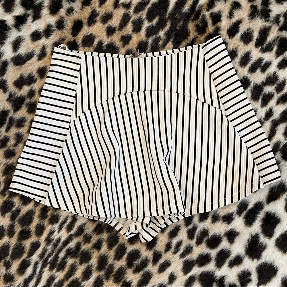 LF mini skort with black and white stripes, stretchy comfortable material